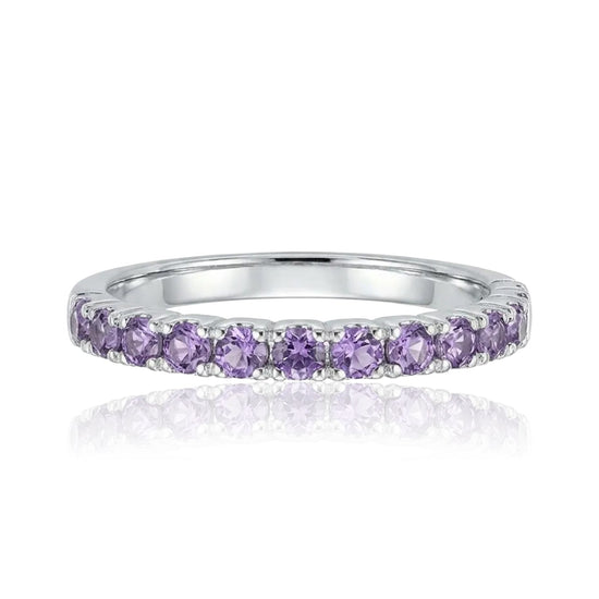 auksinis ziedas su violetiniais akmenimis